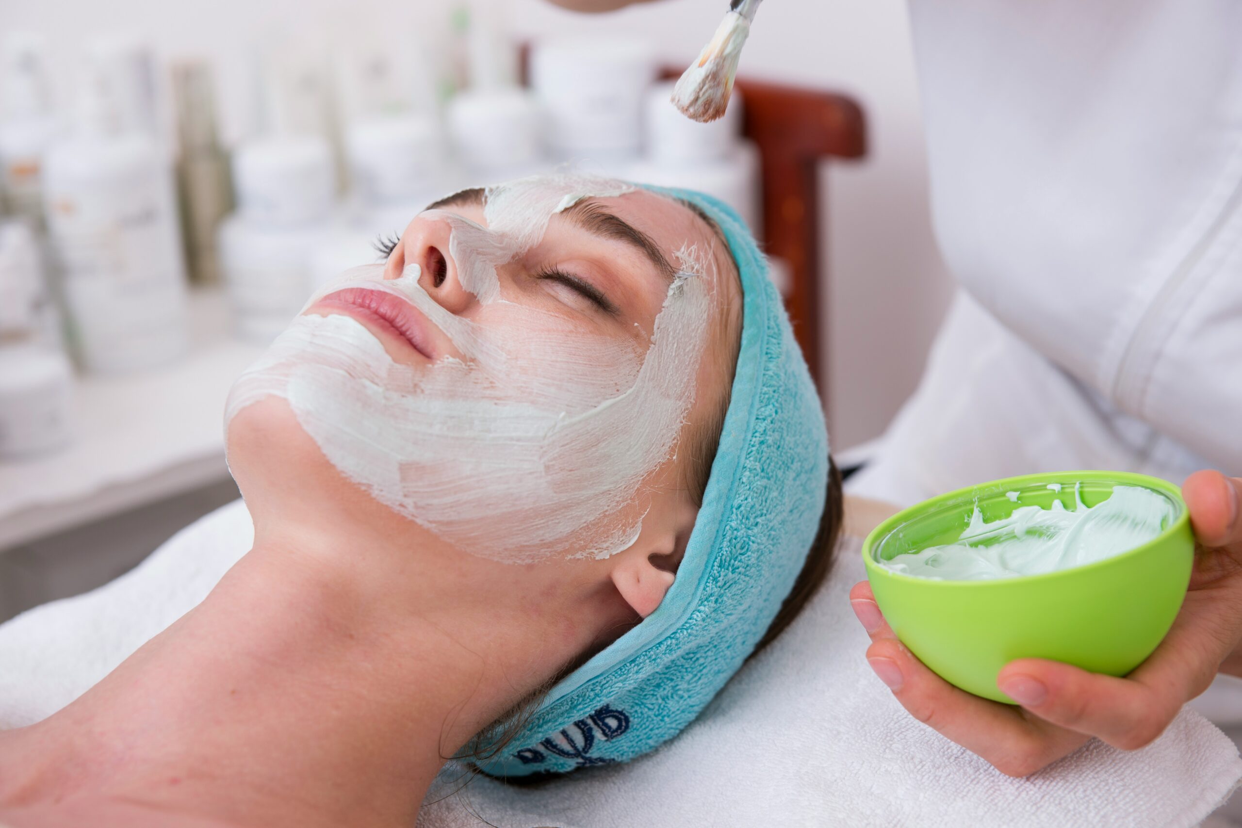 Chemical peel solution being applied to patient face in Maldives